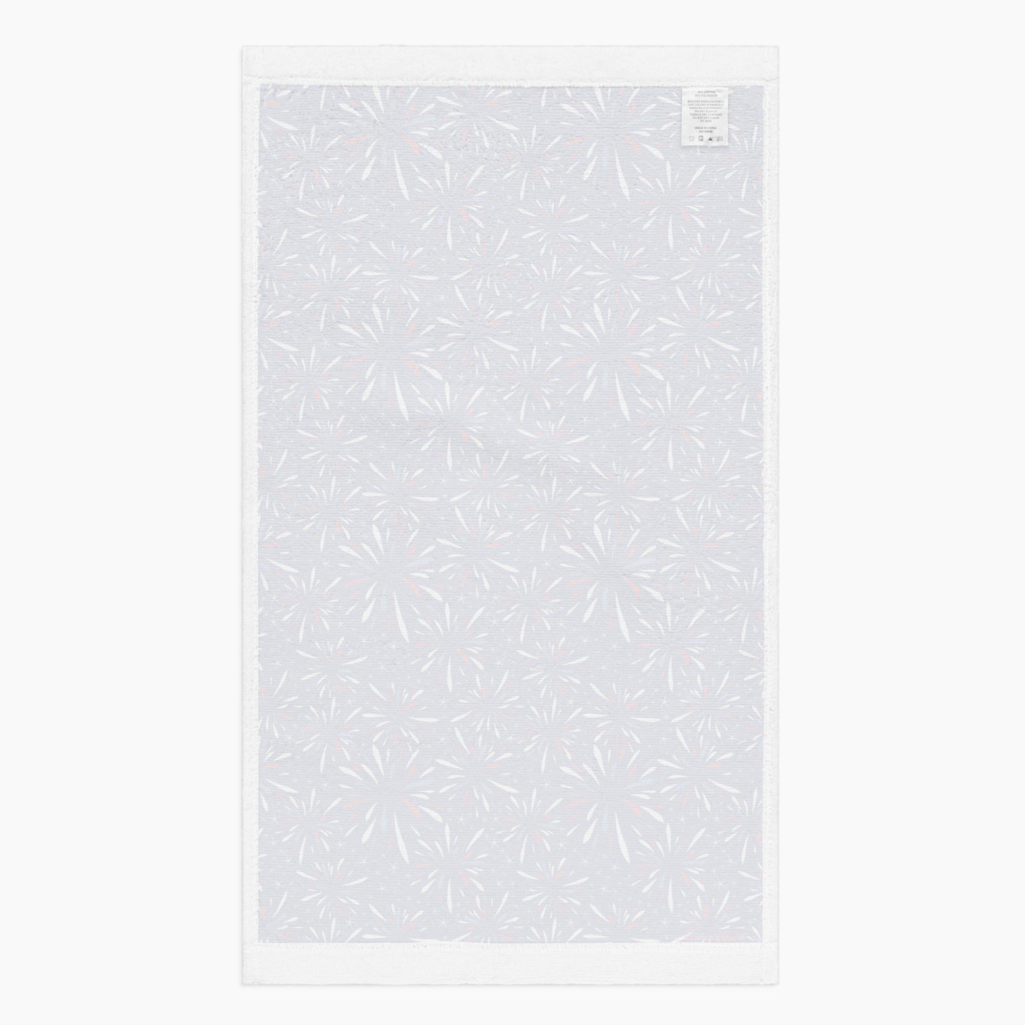 White back of Cloth kitchen hand towel with firework pattern on a white background