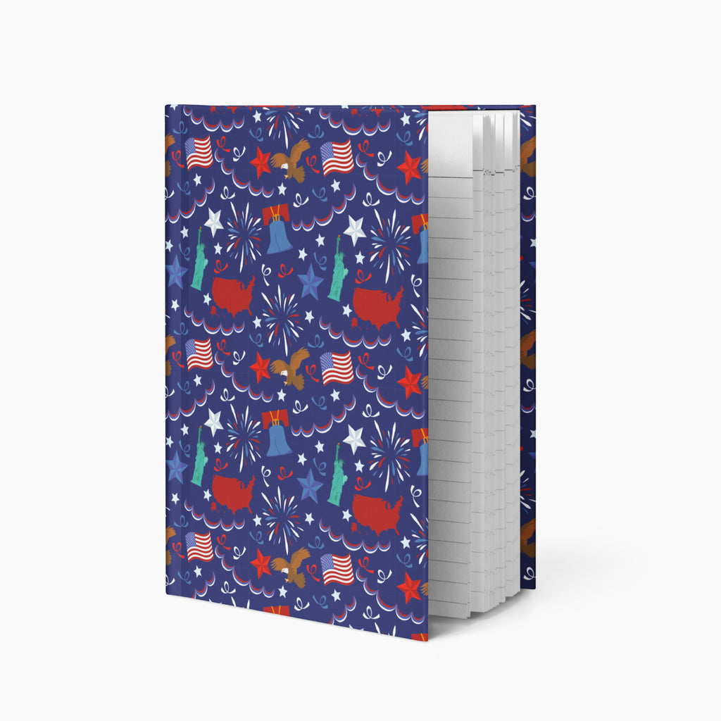 Hardcover journal with patriotic symbol patterned cover design and lined pages on a white background