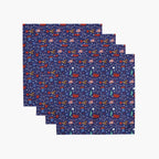 Four cloth napkins with a colorful pattern of patriotic-symbol-themed illustrations on a white background.