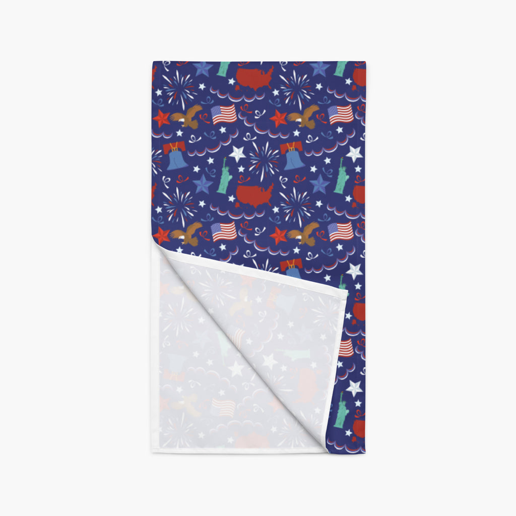 Table runner with patriotic red, white, and blue symbol pattern on a white background