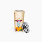 A tall insulated travel tumbler with a cream-colored background and a colorful autumn-themed illustration featuring a scarecrow, pumpkins, and falling leaves. The tumbler is shown with a clear plastic lid on a clean light grey background.