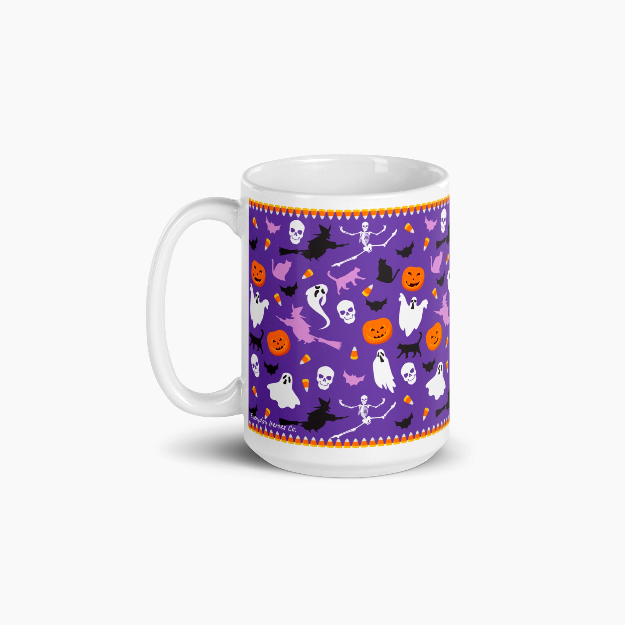 A white ceramic mug featuring a purple Halloween-themed pattern with ghosts, pumpkins, bats, skeletons, candy corn, and witches shown on a light gray background.