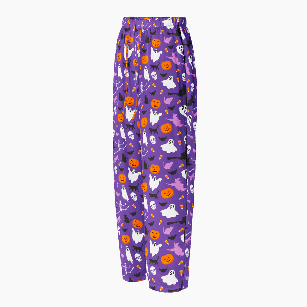 Side view of Purple Halloween-themed pajama pants with an all-over print of white ghosts, orange pumpkins, black bats, and purple witch, shown flat against a light gray background.