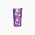 A purple travel tumbler with a Halloween pattern featuring white ghosts, orange pumpkins, black bats, and small white skulls, shown on a light gray background.