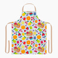 Colorful apron with a summer fruit and basket pattern on a white background