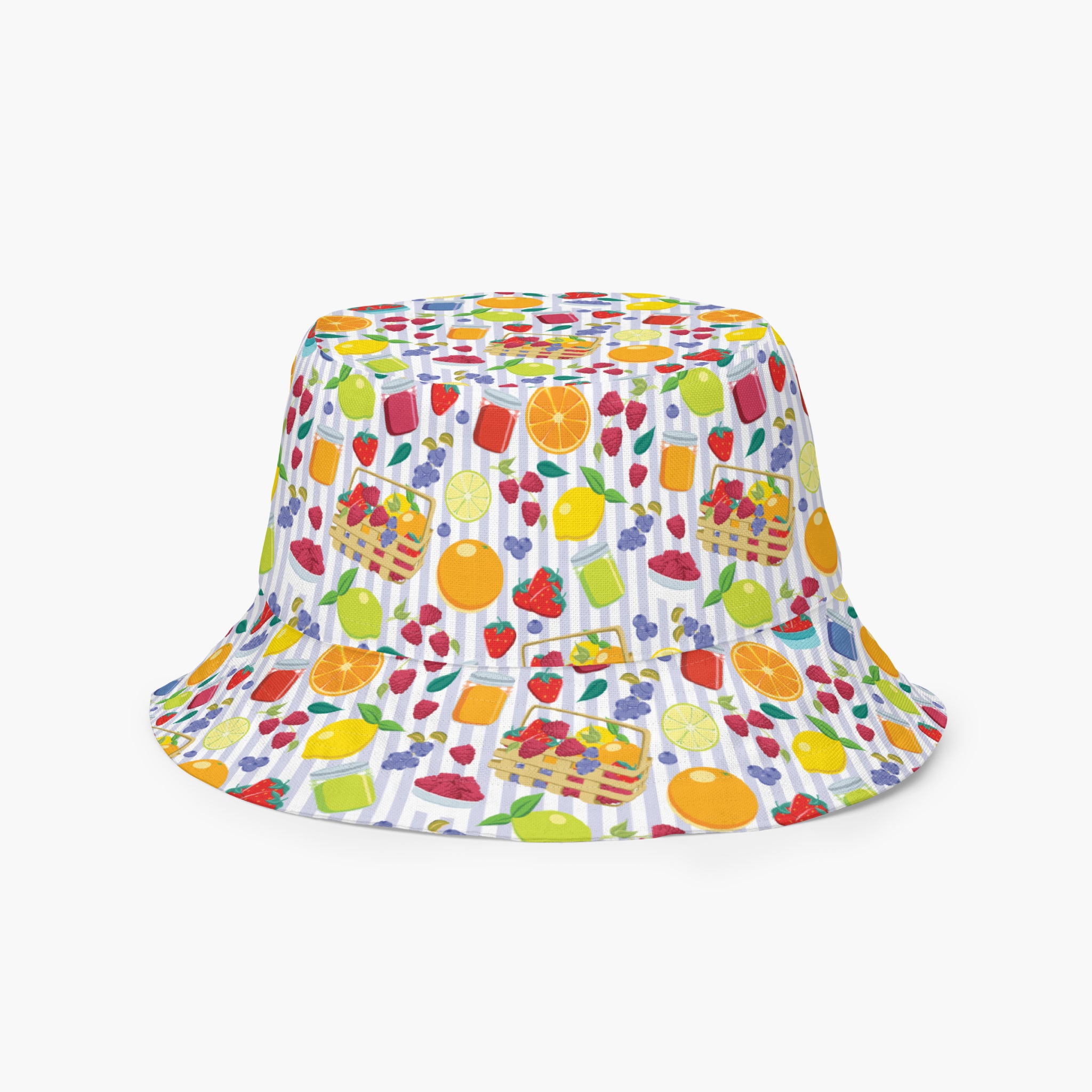 Reversible bucket hat with colorful summer fruit pattern on a white background