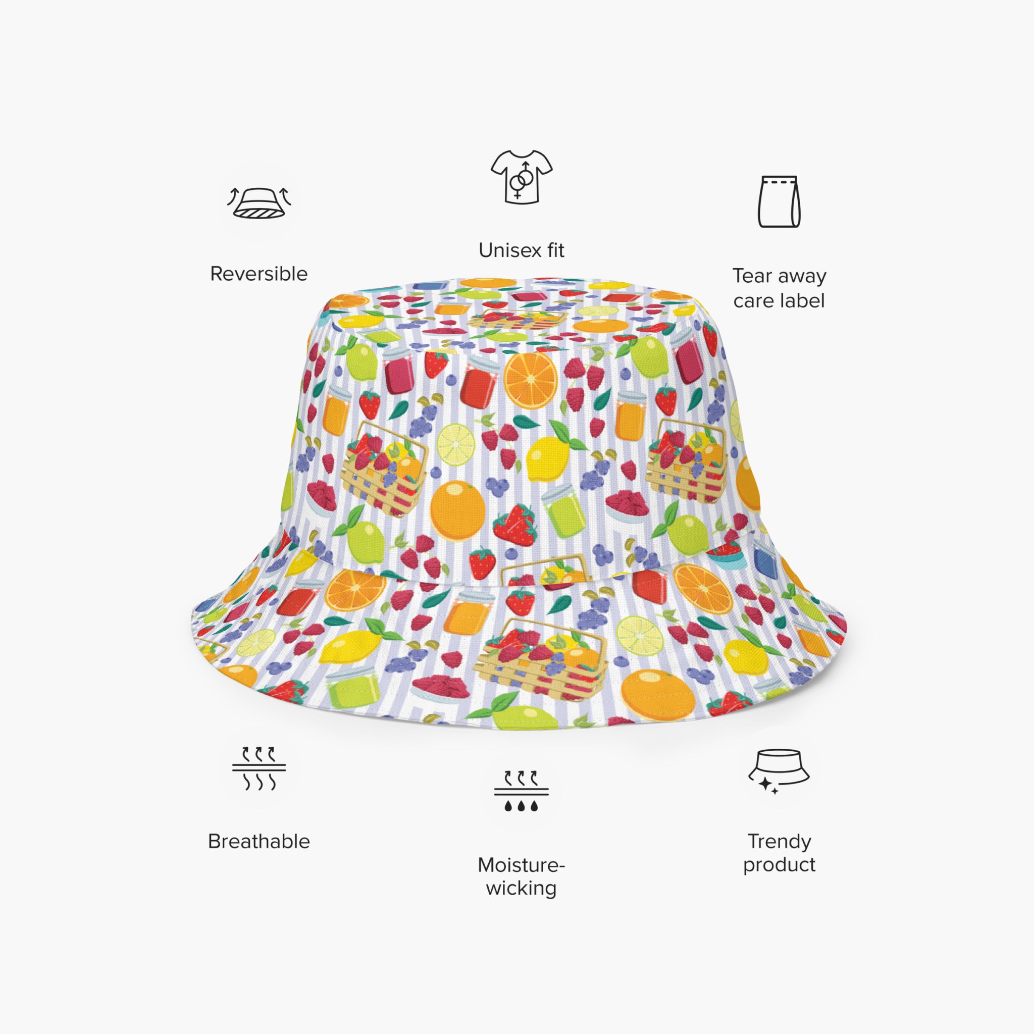 Reversible bucket hat with colorful summer fruit pattern on a white background