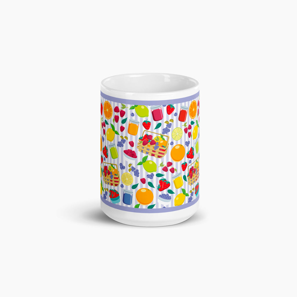 White mug with colorful summer fruit pattern on a white background