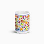 White mug with colorful summer fruit pattern on a white background