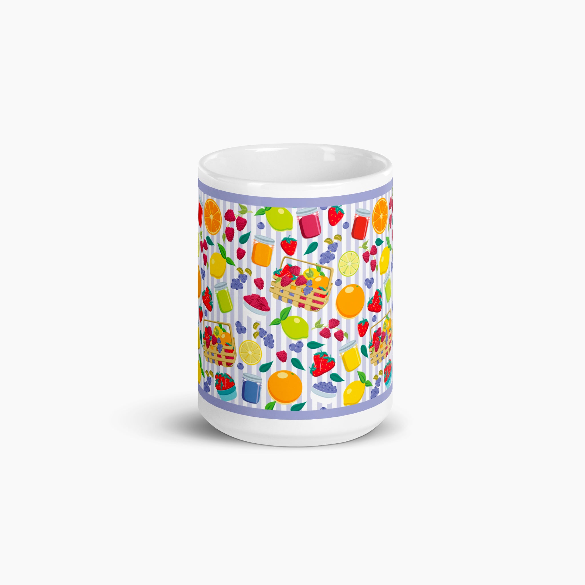 White mug with colorful summer fruit pattern on a white background