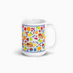 White mug with colorful summer fruit pattern on a white background