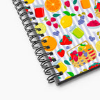 Spiral Notebook exterior, close-up with colorful summer fruit pattern on a white background