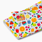 Cloth kitchen hand towel with summer fruits pattern on a white background