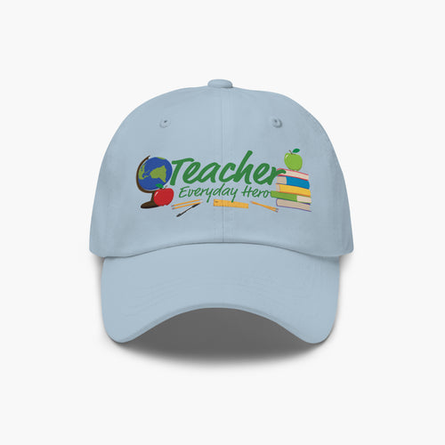 Light blue cap with 'Teacher Everyday Hero' text and teacher-themed graphics on a white background