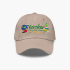 stone colored cap with 'Teacher Everyday Hero' text and teacher-themed graphics on a white background