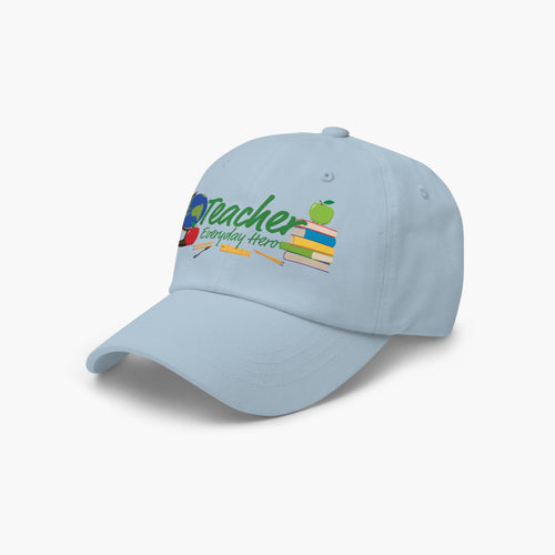 Light blue cap with 'Teacher Everyday Hero' text and teacher-themed graphics on a white background