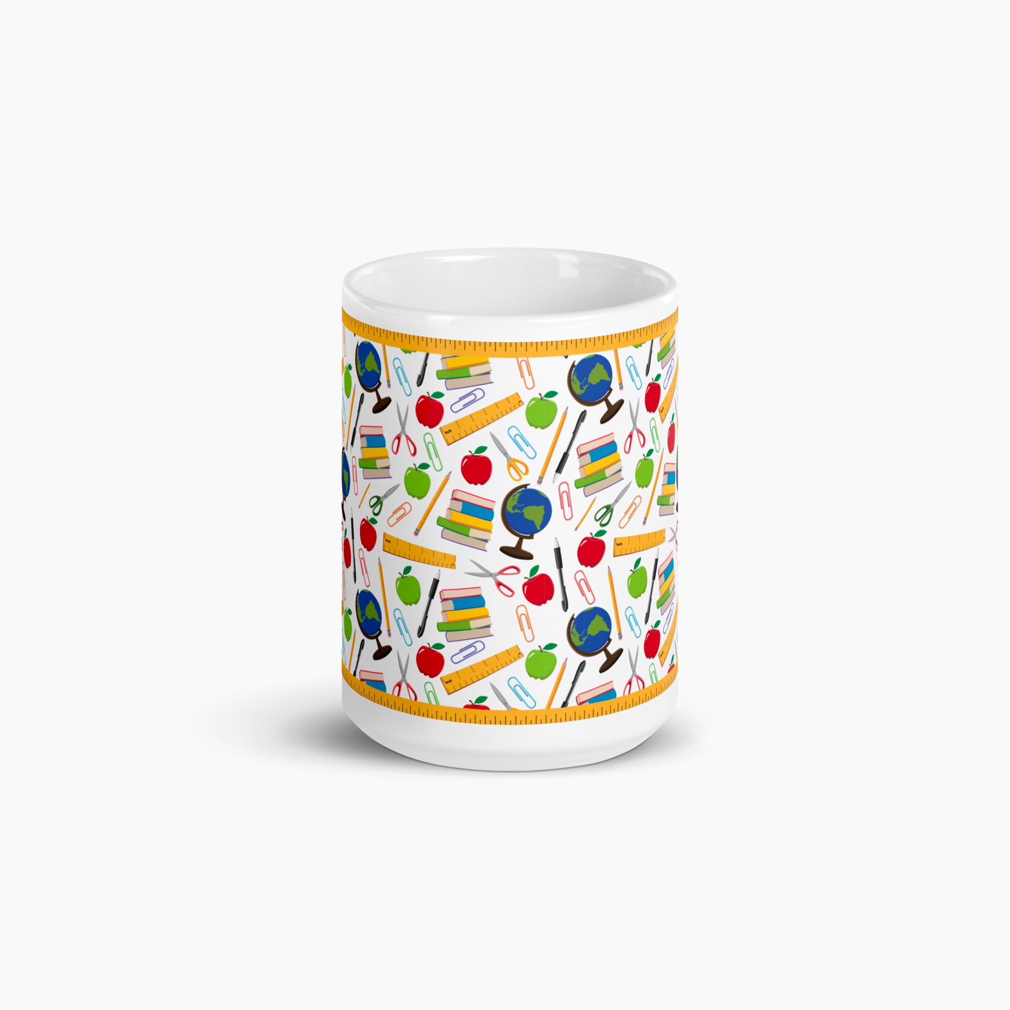 White mug with colorful teacher-themed pattern on a white background