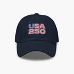 Navy blue cap with 'USA 250' text in red and white on a light gray background