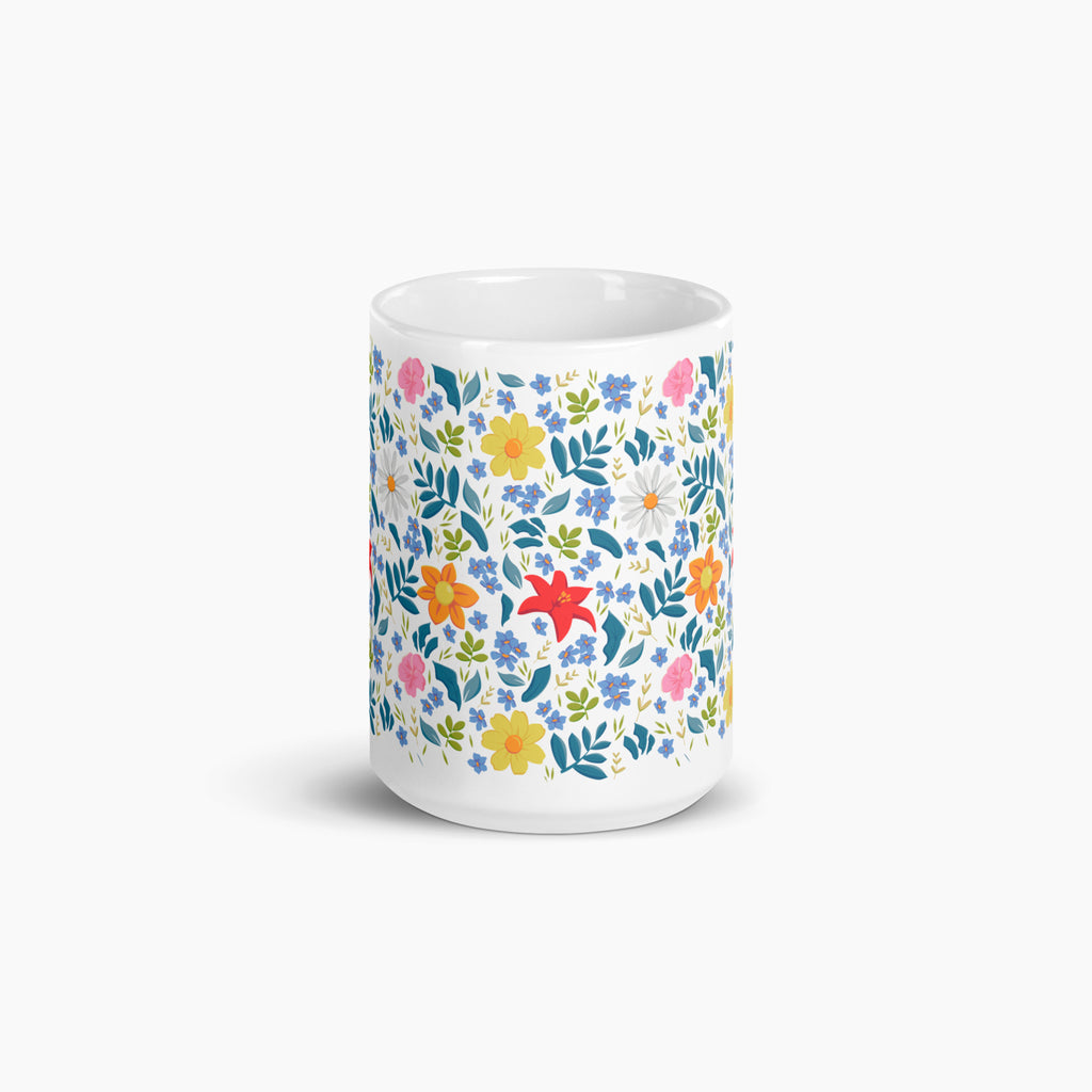 White mug with white floral pattern on a white background