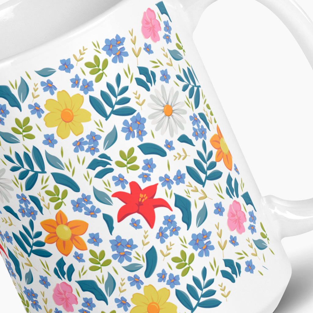White mug with white floral pattern on a white background