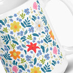 White mug with white floral pattern on a white background
