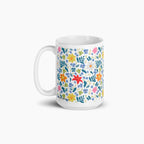 White mug with white floral pattern on a white background