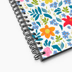 Spiral Notebook exterior closeup with white floral pattern on a white background