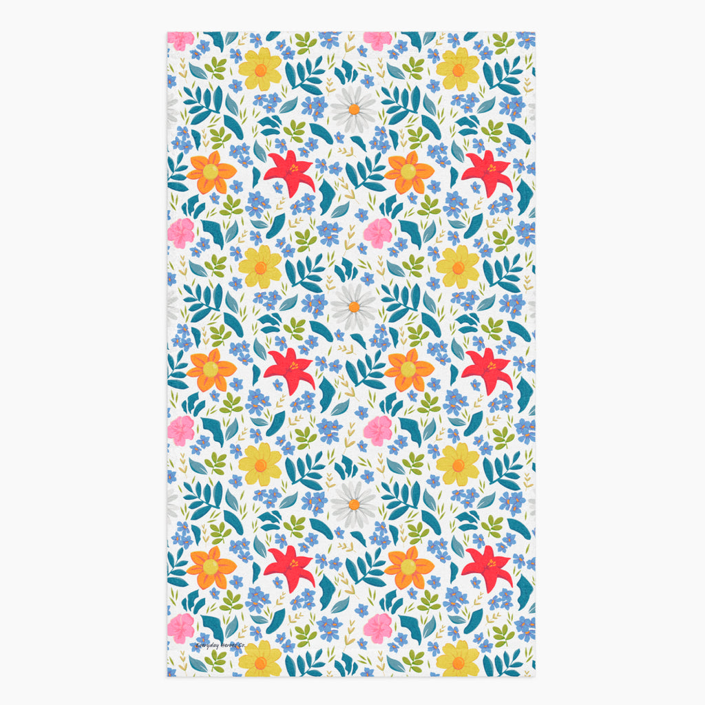 Cloth kitchen hand towel with white floral pattern on a white background