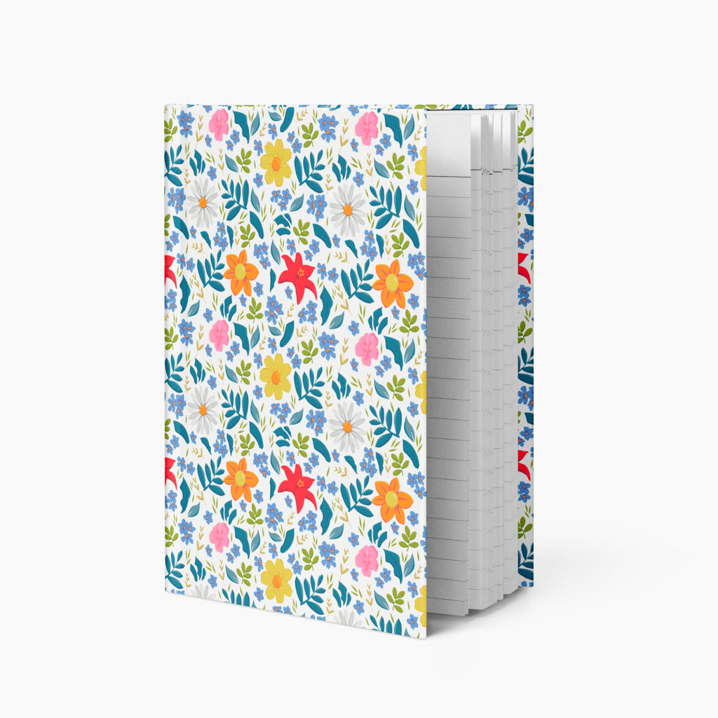 Hardcover journal with white floral patterned cover design and lined pages on a white background